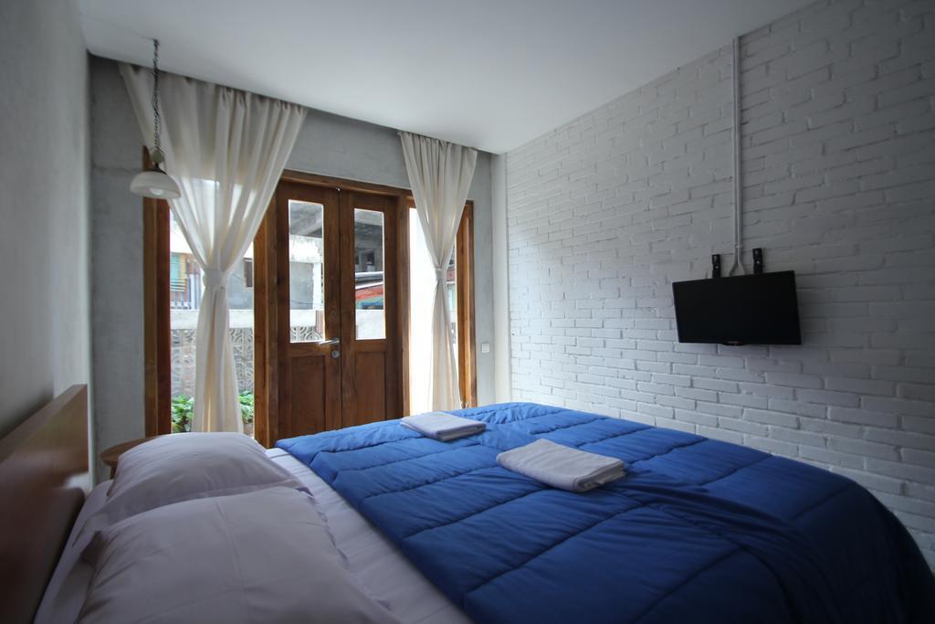 Pawon Cokelat Guesthouse Джок'якарта Номер фото